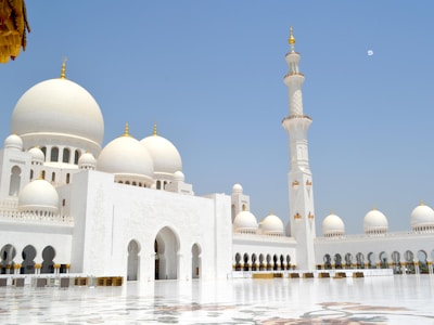 Abu Dhabi desert safari – adventure tourist attraction with golden dunes and sunset